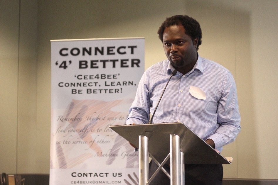 Ayo Akande speaking at a Connect4Better event