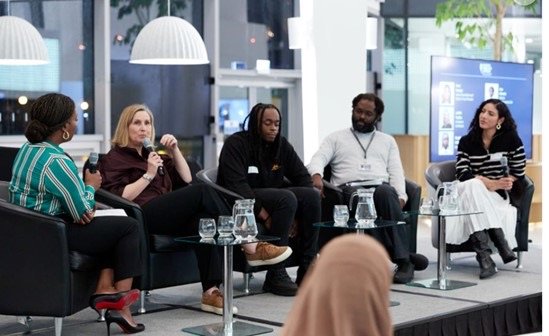 Ayo Akande taking part in a panel discussion